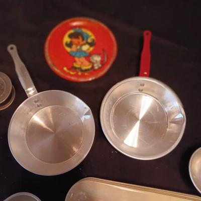 CHILD'S TIN TOY DISHES INCLUDING BAKING, COOKING AND UTENSILS