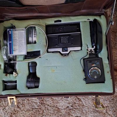 Minolta Camera with accessories and case