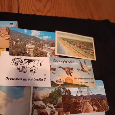 A GOOD VARIETY OF POSTCARDS