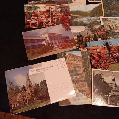 AN ASSORTMENT OF POSTCARDS