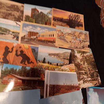 AN ASSORTMENT OF POSTCARDS