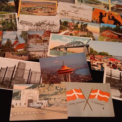 AN ASSORTMENT OF POSTCARDS