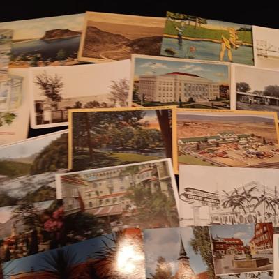 AN ASSORTMENT OF POSTCARDS