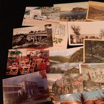 AN ASSORTMENT OF POSTCARDS