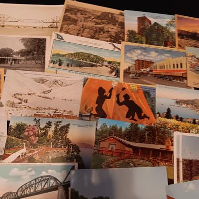 AN ASSORTMENT OF POSTCARDS