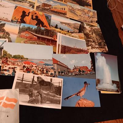 AN ASSORTMENT OF POSTCARDS