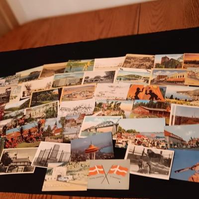 AN ASSORTMENT OF POSTCARDS