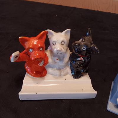 3 GLAZED BISQUE DOGS PLAYING CARDS TOOTHBRUSH HOLDER AND A PORCELAIN ASHTRAY