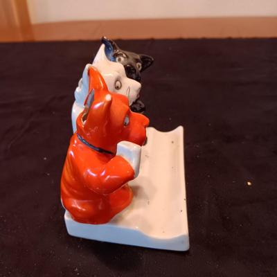 3 GLAZED BISQUE DOGS PLAYING CARDS TOOTHBRUSH HOLDER AND A PORCELAIN ASHTRAY