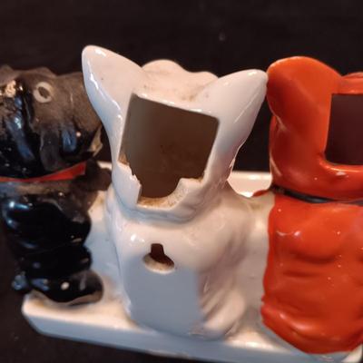 3 GLAZED BISQUE DOGS PLAYING CARDS TOOTHBRUSH HOLDER AND A PORCELAIN ASHTRAY