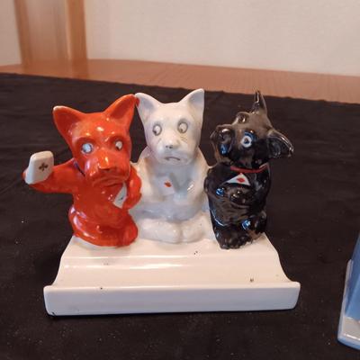 3 GLAZED BISQUE DOGS PLAYING CARDS TOOTHBRUSH HOLDER AND A PORCELAIN ASHTRAY
