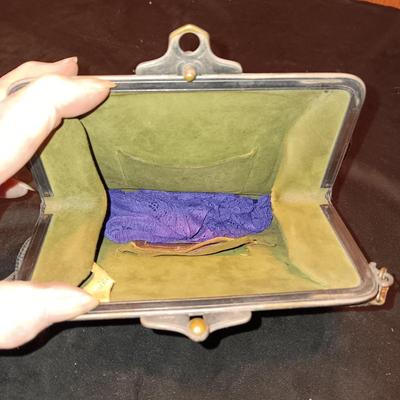 ANTIQUE TOOLED LEATHER PURSE AND A BAKELITE BRUSH