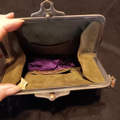 ANTIQUE TOOLED LEATHER PURSE AND A BAKELITE BRUSH