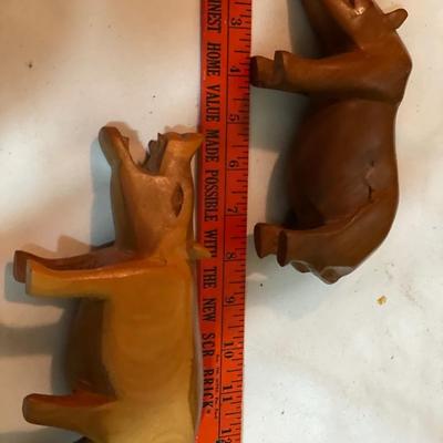 Wood carved rhino and hippo