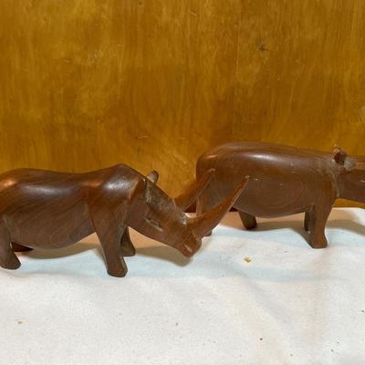 Wood carved rhino and hippo