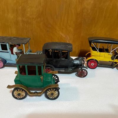 4 vintage plastic model cars