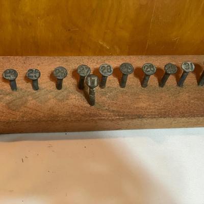 Vintage numbered railroad nails
