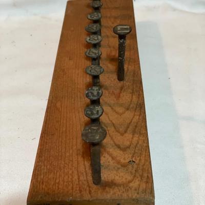 Vintage numbered railroad nails