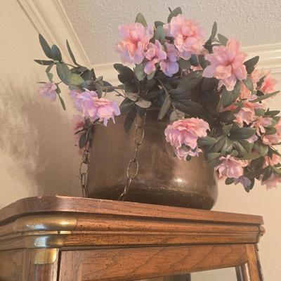 Copper pot with flowers