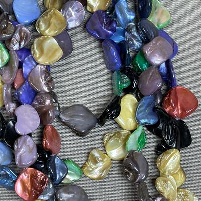 Sale Photo Thumbnail #81: 5 strands of colorful mother of pearl beads. Longest strand is approx 30 inches. This necklace weighs almost a pound!