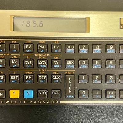 Sale Photo Thumbnail #509: Texas Instruments solar-powered scientific calculator TI-30X IIS, handles fractions, mixed numbers, statistics, trigonometry, etc.  HP-12C battery-powered financial calculator can calculate interest, loan payments, standard deviation, net present value (N