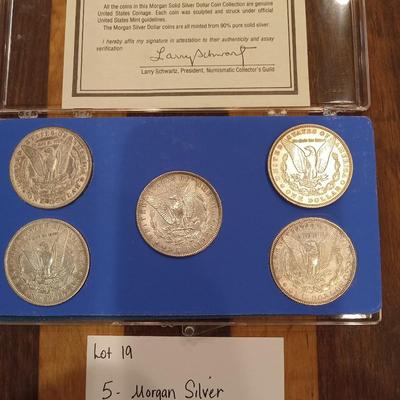 5 Morgan Dollars.