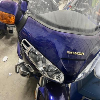 2003 Honda Goldwing with training wheels.