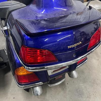 2003 Honda Goldwing with training wheels.