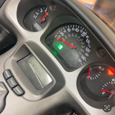 2003 Honda Goldwing with training wheels.