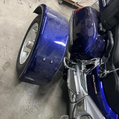 2003 Honda Goldwing with training wheels.