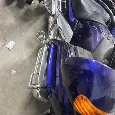 2003 Honda Goldwing with training wheels.