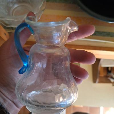 Crackle Glass pitcher with blue handle