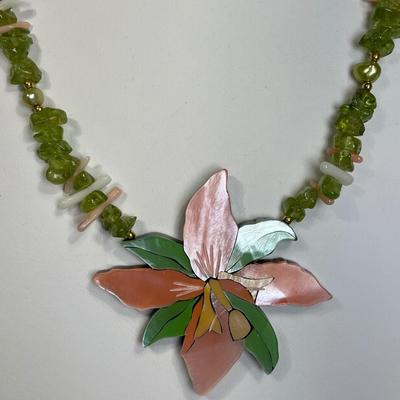 Sale Photo Thumbnail #173: 18” necklace with pierced earrings. Mother of pearl inlay pendant. Peridot chips, pearl and coral beads.