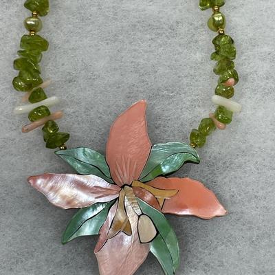 Sale Photo Thumbnail #176: 18” necklace with pierced earrings. Mother of pearl inlay pendant. Peridot chips, pearl and coral beads.