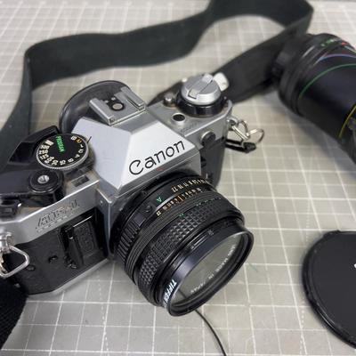 CANNON AW-1 35mm Film Camera with 2 Lenses