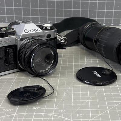 CANNON AW-1 35mm Film Camera with 2 Lenses