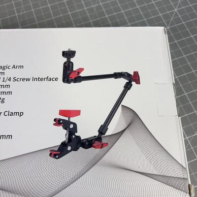 Super Magic Arm Clamp to hold electronics and Cameras with, NEW in the Box