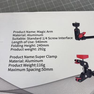 Super Magic Arm Clamp to hold electronics and Cameras with, NEW in the Box