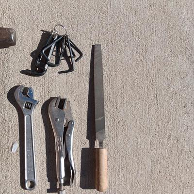 SLEDGE HAMMER, ALLEN WRENCHES, FILE, CRESCENT WRENCH AND VISE GRIPS