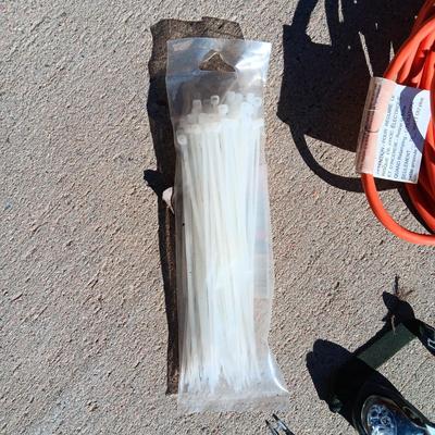 CROW BAR, TROUBLE LIGHT, GAS CAN, BUNGEE CORDS, HEADLIGHT AND ZIP TIES