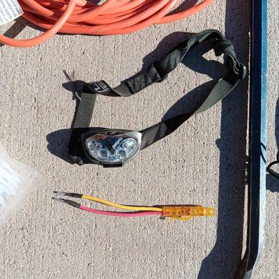CROW BAR, TROUBLE LIGHT, GAS CAN, BUNGEE CORDS, HEADLIGHT AND ZIP TIES