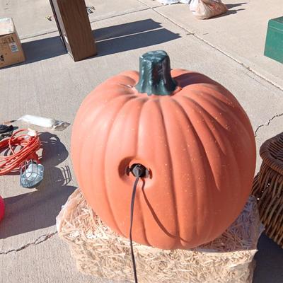 LARGE LIGHTED PUMPKIN, NEW STRAW BALE AND A LARGE WICKER BASKET W/REMOVABLE LID