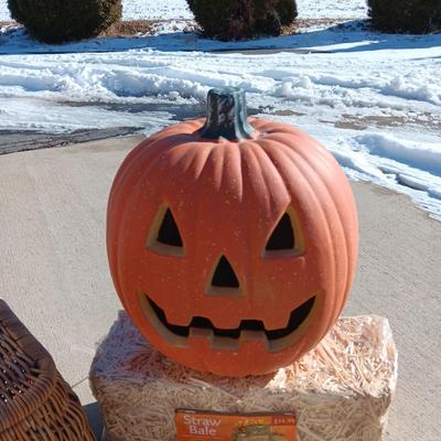 LARGE LIGHTED PUMPKIN, NEW STRAW BALE AND A LARGE WICKER BASKET W/REMOVABLE LID