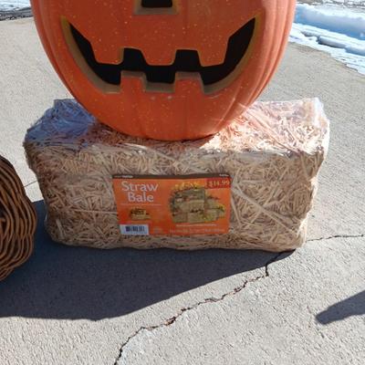 LARGE LIGHTED PUMPKIN, NEW STRAW BALE AND A LARGE WICKER BASKET W/REMOVABLE LID