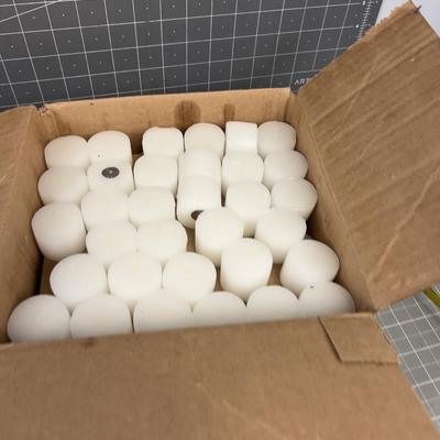 Votives, Lots of white votive Candles 