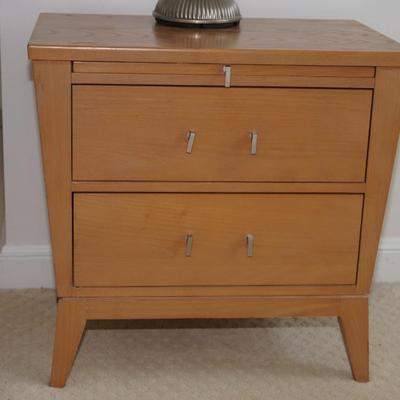 Sale Photo Thumbnail #213: this two drawer end table is of oak wood with brush chrome handles. 
Ethan Allen 
two dovertailed drawers that open and close easy. 
the top has a shelf that pulls out with a black laminate cover.
In good condition. No damage noted and the top has little 