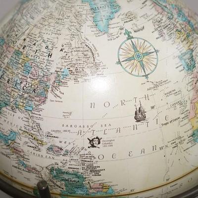 Sale Photo Thumbnail #232: a lightweight decorative stand that holds the world globe in antique style 
World globe that you can take out of the stand but does not turn
Height: 41"