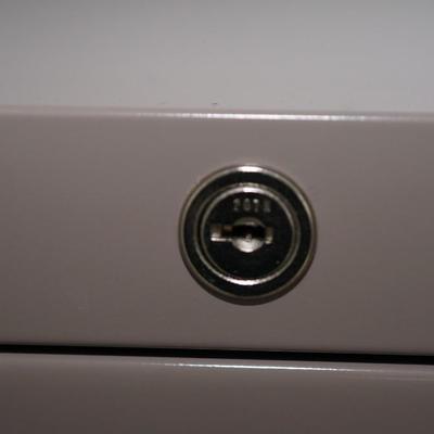 DOUBLE LATERAL STEEL FILE CABINET W/ FOUR DRAWERS