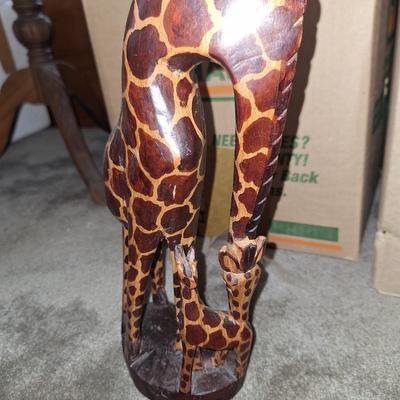 Wooden giraffe and baby