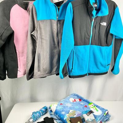 Lot M 372 Two North Face Fleece Jackets ( size XL ) / One Fila Fleece Jacket (size Lg) / Plush Throw / Mittens / Umbrella
